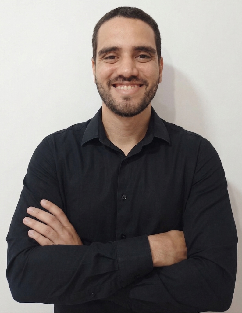 Vertical portrait of a professional male data analyst smiling